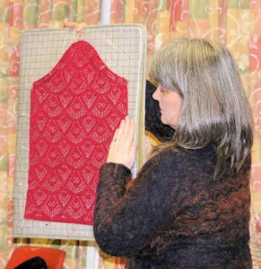 Erica Thomson showing how to block knitted fabric
