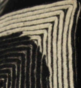 detail of a black and white cushion cover