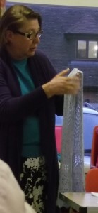 Chris Williams describing her lacy shawl at May 2011 meeting