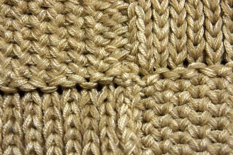 Tuck stitch strips joined on the machine