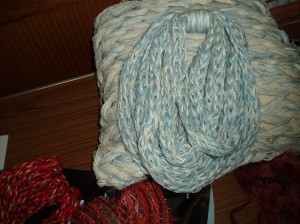 Arm knitted cords using different yarns