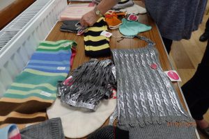 Interesting items - mainly fancy scarves - brought by speaker